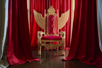 Ornate red and gold throne inside Great Barrington Dispensary in Great Barrington, Massachusetts